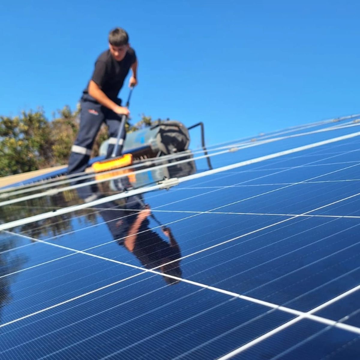 Rooftop solar panels being cleaned in Pretoria